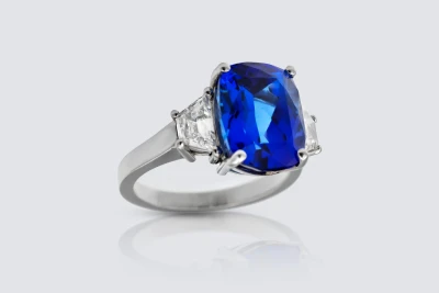 Platinum 7.14ct Tanzanite and 0.84ct Diamond Three Stone Ring Size N