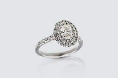 Platinum 0.50ct Oval Diamond Double Halo Ring with 0.41ct Shoulder and Halo Diamonds Size M